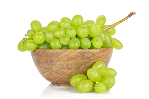 fresh green grape isolated on white - luminant imagens e fotografias de stock