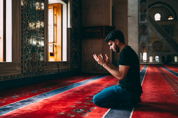 istock Muslim Man Praying in Mosque 1166293899