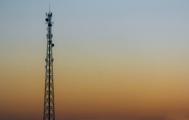 istock Silhouette of telecommunications tower at sunset. 1166296885