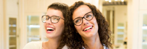 istock Woman selecting eyeglasses in the optical shop 1166297080