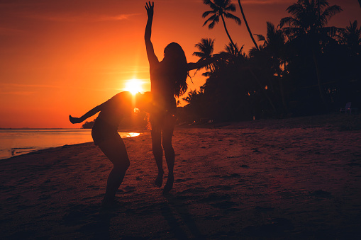 Crowd people friends sunset beach holidays