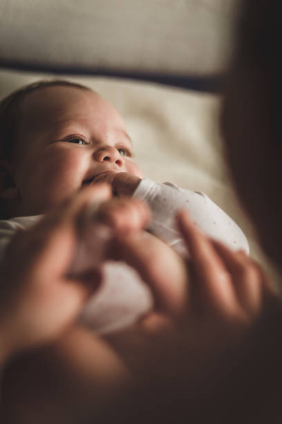 istock Adorable baby having a giggle while playing with her mother 1166297750