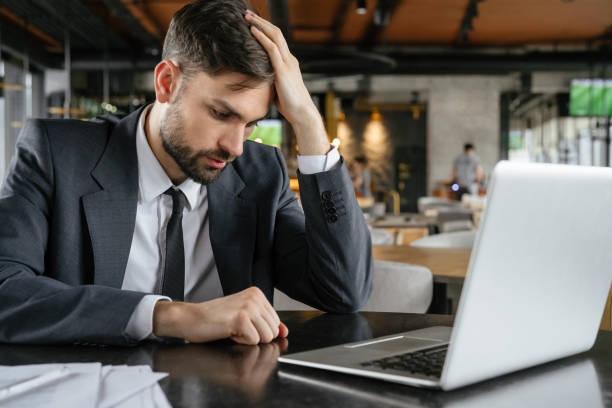 istock Businessperson on business lunch at restaurant sitting looking for solution 1166298429
