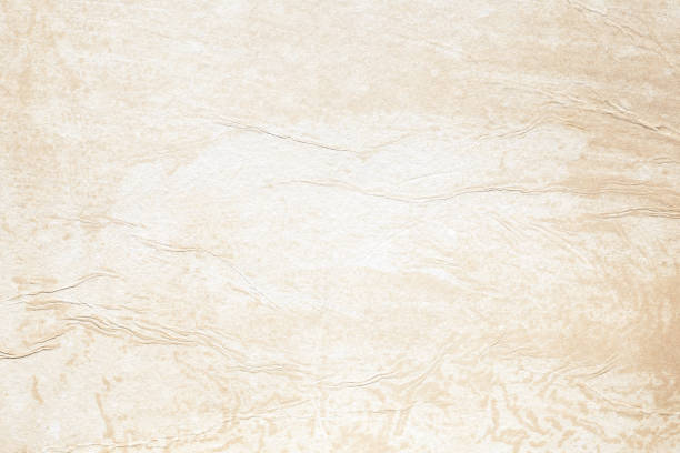 istock Old Crumpled grunge brown paper texture 1166298864