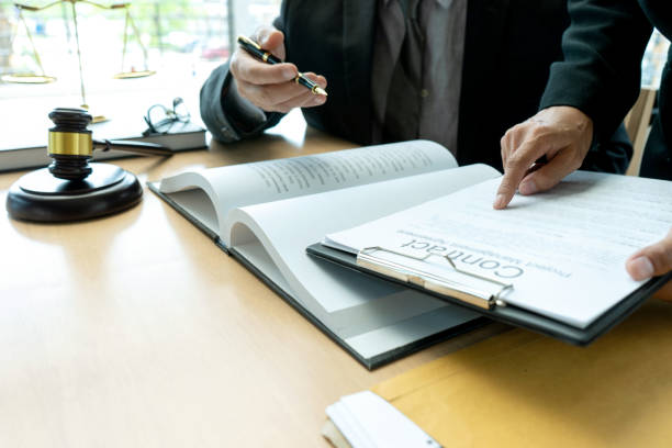 istock Judge or lawyer talking  with team 1166304700