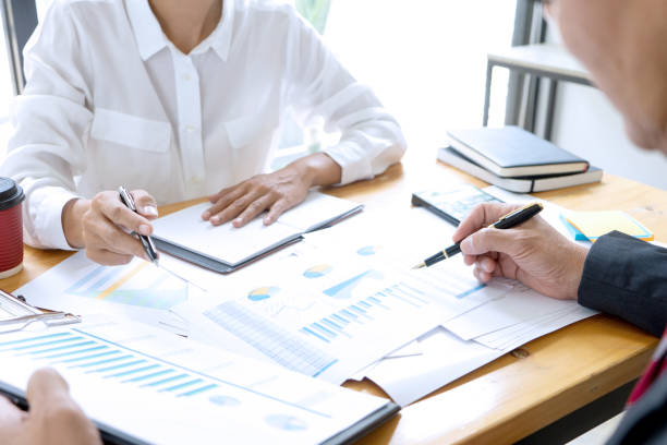 istock Businessman coaching office staff 1166304740