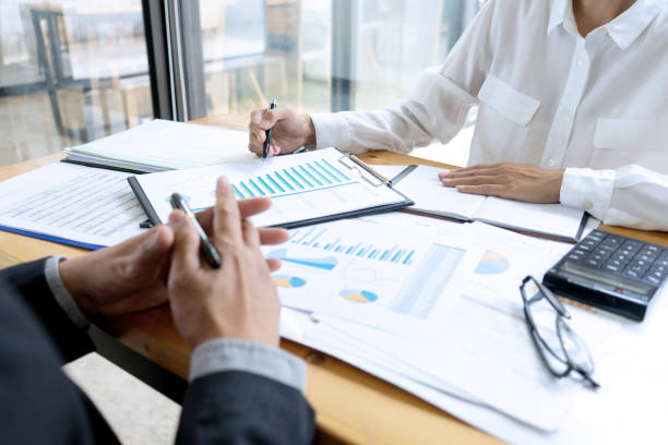 istock Businessman coaching office staff 1166304747