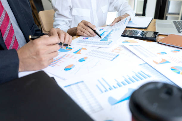 istock Businessman coaching office staff 1166304762