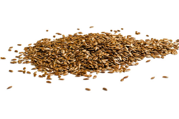 istock Heap of linseeds, flax seeds on white background. 1166305981