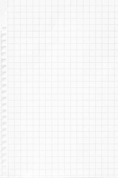 istock Closeup white checkered notebook sheet of paper texture background. Vertical picture. 1166306260