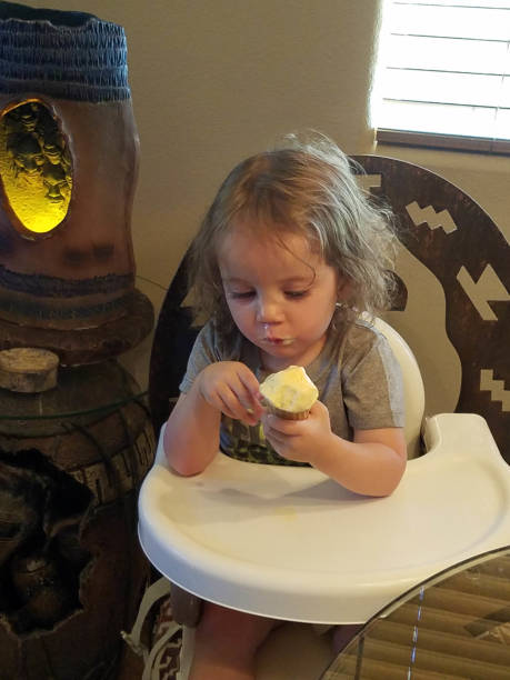 istock Toddler eating an ice cream cone 1166307009