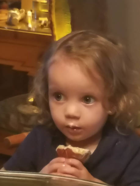 istock Toddler before and while eating an ice cream cone 1166307070