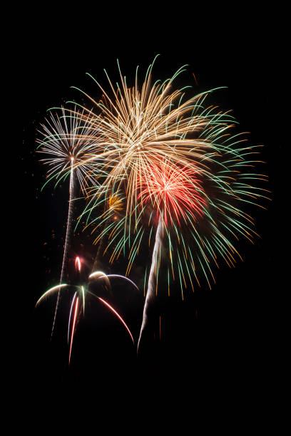 istock Beautiful fireworks display lights up the night time sky 1166308783