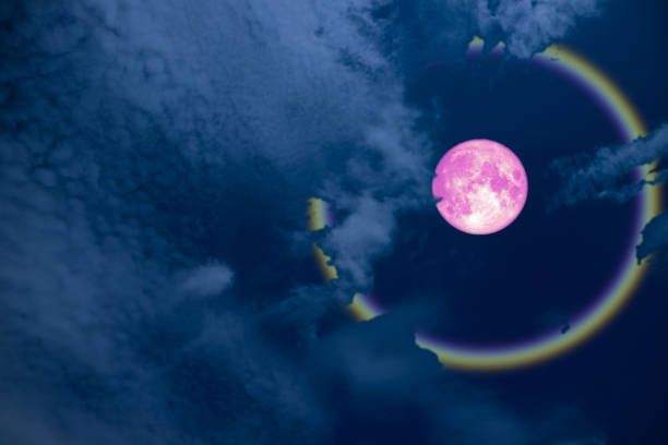 istock full pink halo moon and rainbow on night sky 1166310179