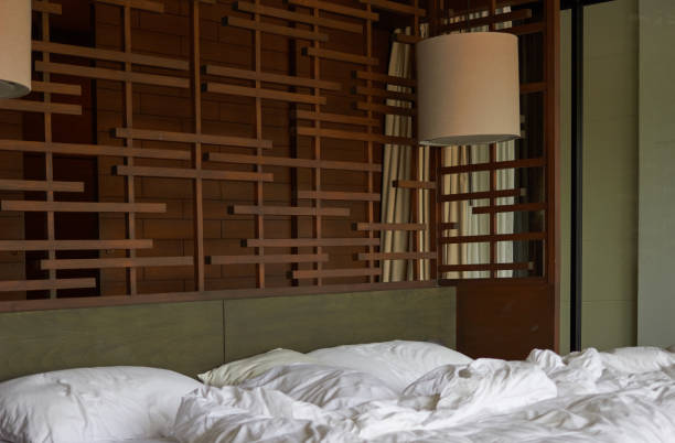 istock Bed room in hotel in vintage asian style 1166314205