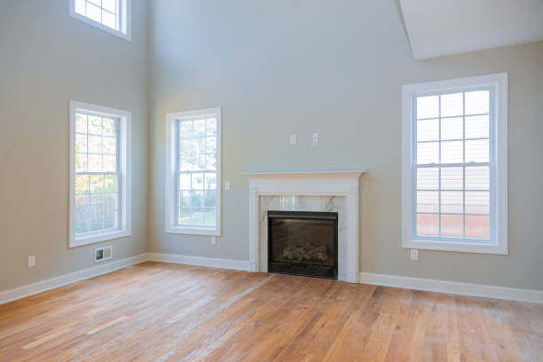 istock Interior new house construction fireplace in light room 1166314842