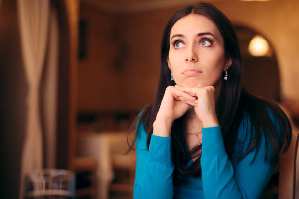 istock Sad Girl Waiting for her Date in a Restaurant 1166315231