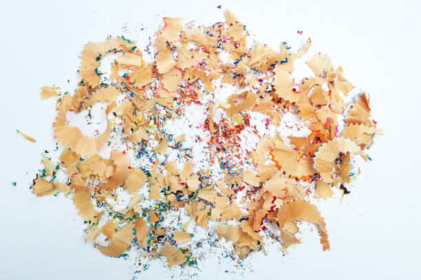 istock Shavings from multicolored pencils on white 1166317094