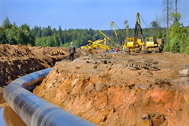 Gas pipeline, variant 2 Construction of the gas pipeline, Leningradskaya oblast, Russia. pipeline stock pictures, royalty-free photos & images