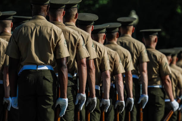 Washington, D.C., USA - July 22, 2019: The US Marine Corp Honor Guard enact their color guard ceremonies at dawn. The ceremonies take place at dawn at the base of the Lincoln Memorial
