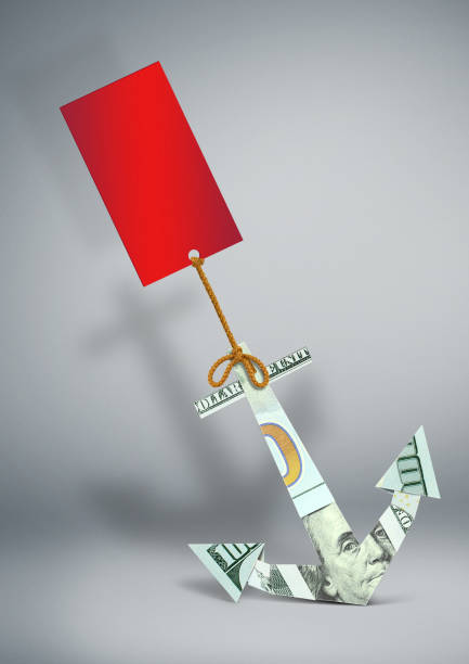 istock financial problems concept, anchor made of money with label 1166325098
