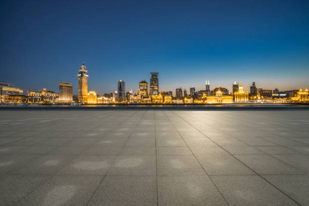 istock Empty floor and modern city buildings in Shanghai at night 1166325941