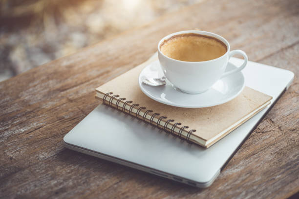 istock Empty of white ceramic coffee cup on wooden table 1166330387