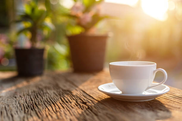 istock White ceramic coffee cup on wooden table or counter 1166330479