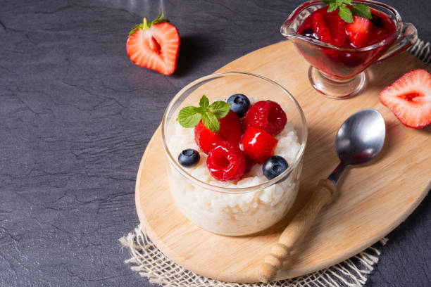 istock delicious milk rice with different berries and red fruit jelly 1166332637