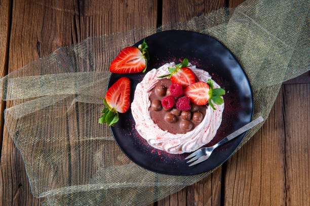light pavlova with fresh fruits and chocolate