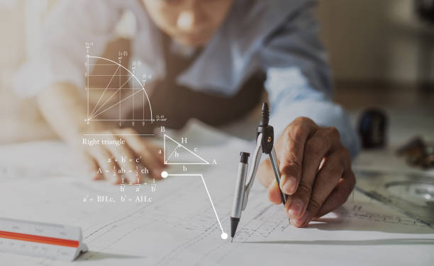 Architect working on blueprint.engineer inspective in workplace - architectural project, blueprints,ruler,calculator,laptop and divider compass. Construction concept. Engineering tools, working concept. arquitecto que trabaja en blueprint.engineer inspectivo en el lugar de trabajo - proyecto arquitectónico, planos, regla, calculadora, computadora portátil y brújula divisora. concepto de construcción. herramientas de ingeniería, concepto de trabajo.
