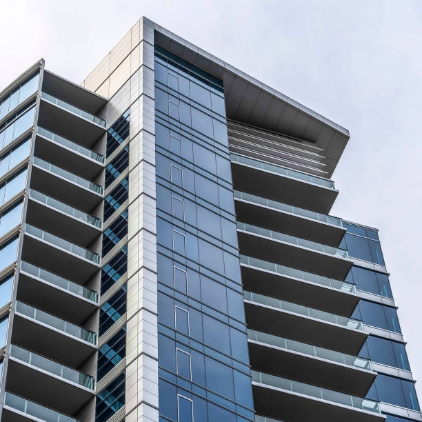 istock Square Multi storey building with a modernist and minimalist architectural design 1166335286