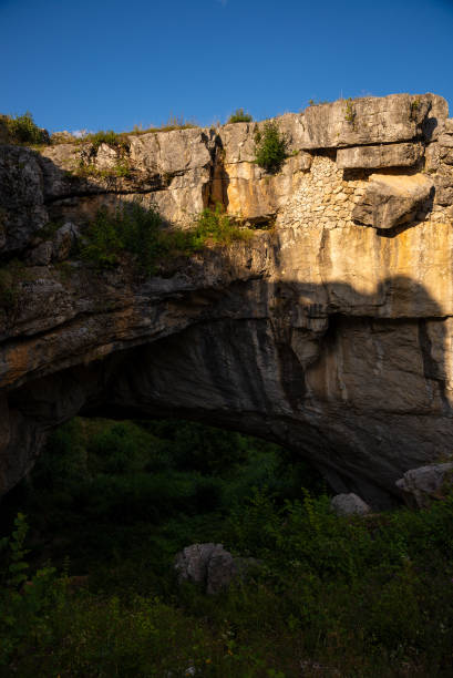 istock landscape with God's Bridge a natural bridge in Romania 1166335531