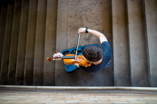 istock Street musician playing violin 1166335580
