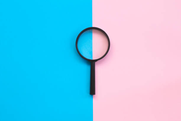 istock A colorful background with magnifying glass 1166339443