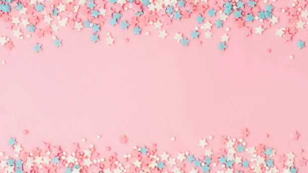 Photo of Sprinkles on pink, copy space, banner