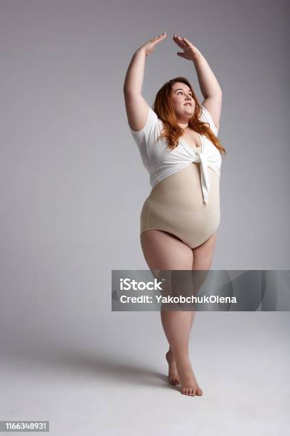 incident zich zorgen maken Broer Fat Lady With Red Hair Posing For Camera In Studio Stock Photo - Download  Image Now - Overweight, Dancing, Ballet Dancer - iStock