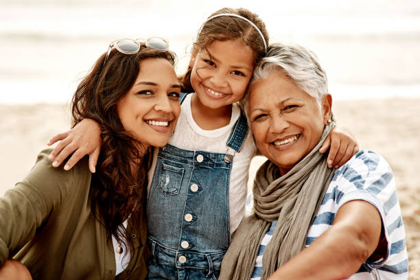istock Three generations of beautiful smiles 1166350039
