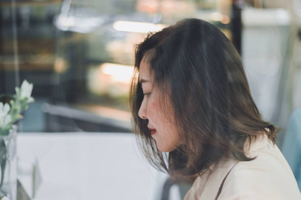 istock A woman sitting by the mirror 1166351236