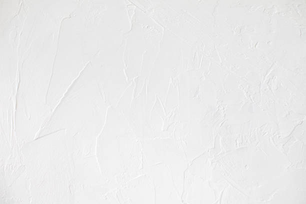istock white colored low contrast Concrete textured background with roughness and irregularities 1166353377