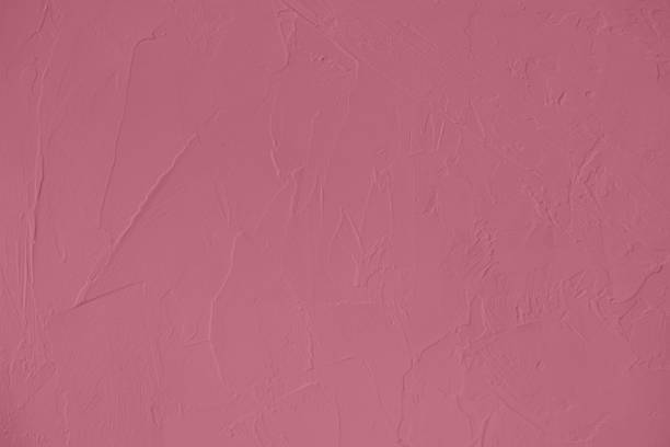 istock dark pink colored Concrete textured background 1166353411