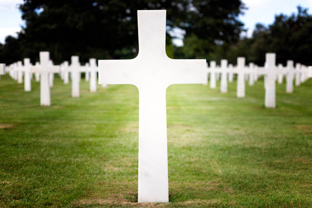 American War Cemetery at Omaha Beach, Normandy (Colleville-sur-Mer) Colleville-sur-Mer, France. August 1, 2019: The Normandy American Cemetery and Memorial is a World War II cemetery and memorial in Normandy, France. It honors American troops who died in Europe during World War II. Almost 9,400 soldiers are buried there. world war ii cemetery allied forces d day stock pictures, royalty-free photos & images