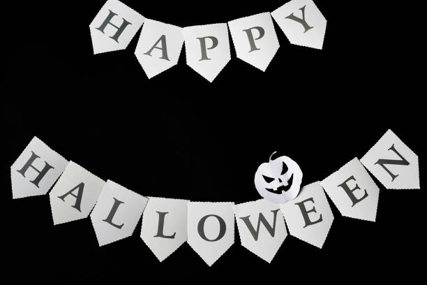 istock Happy Halloween written on black Background with pumpkin, copy space 1166354656