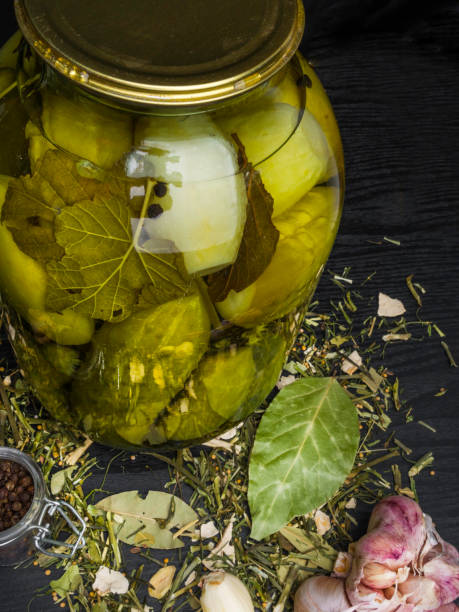 istock Glass jars with pickled cucumbers 1166355730
