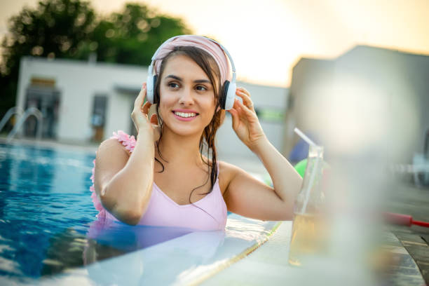 istock Woman Relaxing In The Pool 1166357954