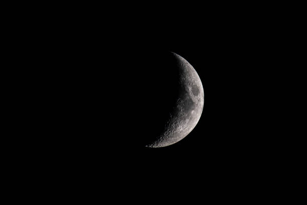 istock Moon with a clearly visible moon surface in the dark night sky. 1166358415
