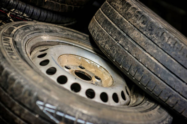 istock Seasonal tyre replacement. Tire service 1166359855