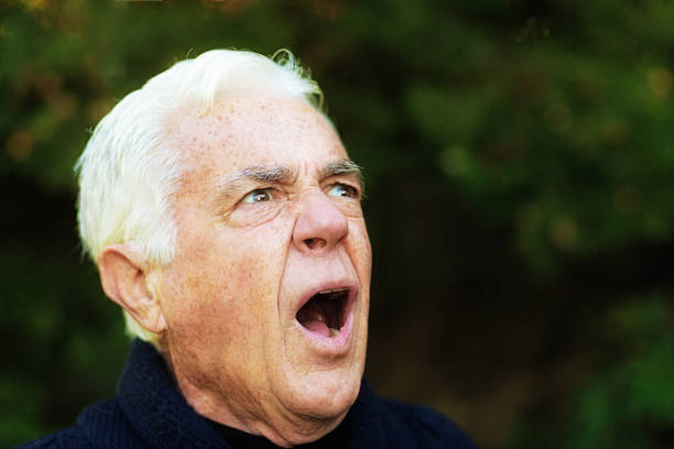 istock Shocked senior man gasps in horror 1166360066