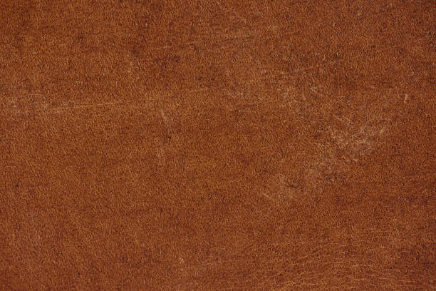 istock Close up brown genuine leather texture background 1166360488