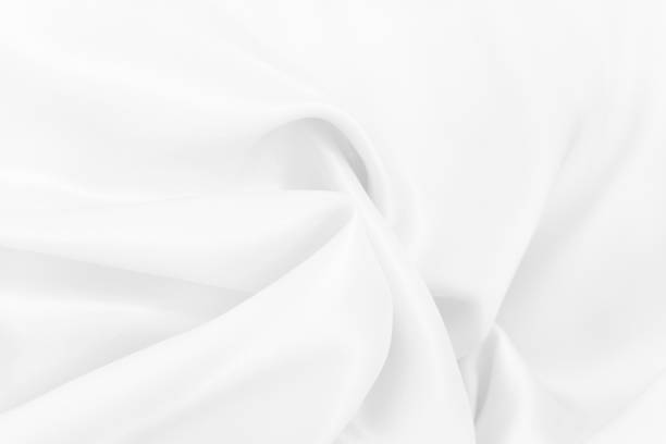 istock White fabric cloth texture for background and design art work, beautiful crumpled pattern of silk or linen. 1166361690